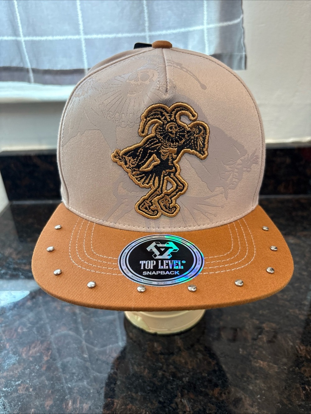 Top Level Two-Tone Brown Snapback Hat with Embroidered Jester Patch